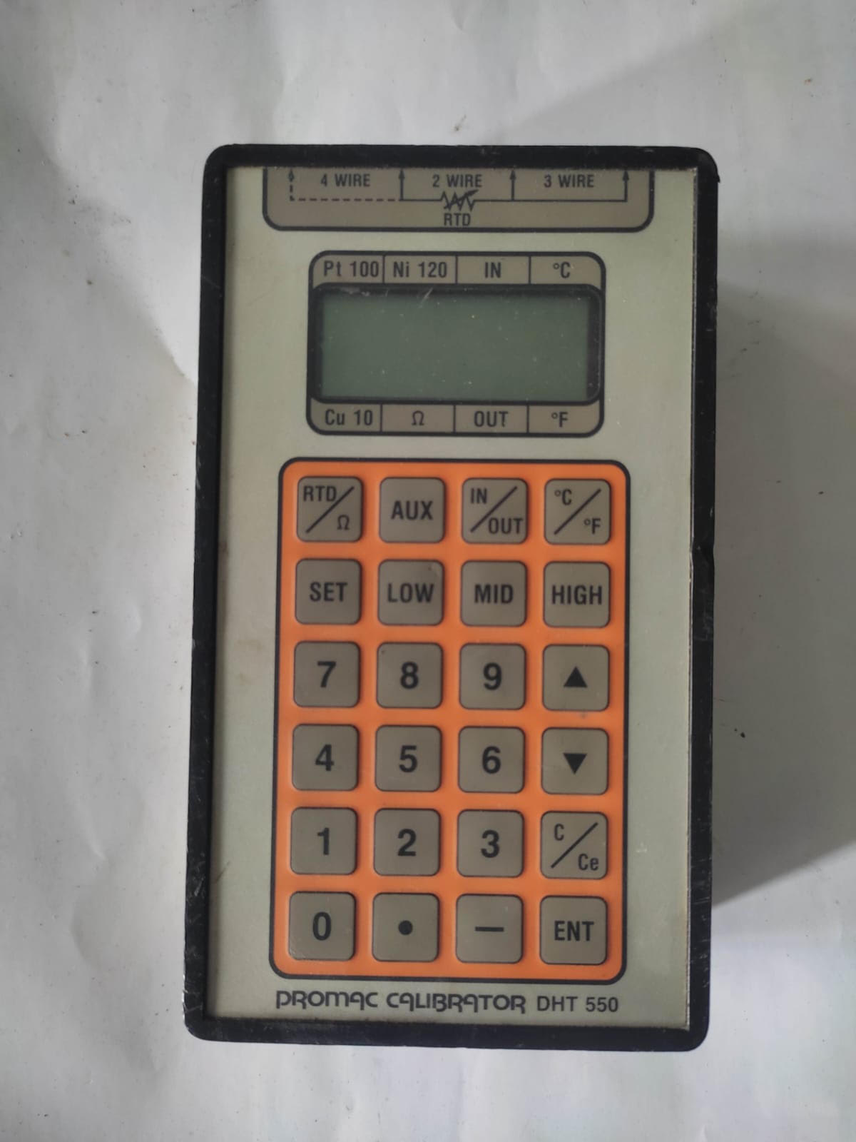 Promac DHT 550 handheld temperature calibrator with orange keypad